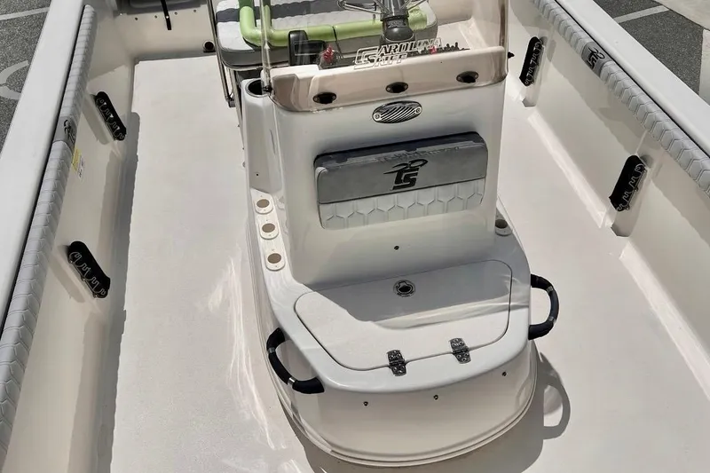 Slide: The Image of 2026 Carolina Skiff 19 LS boat interior with console and seating. - 5
