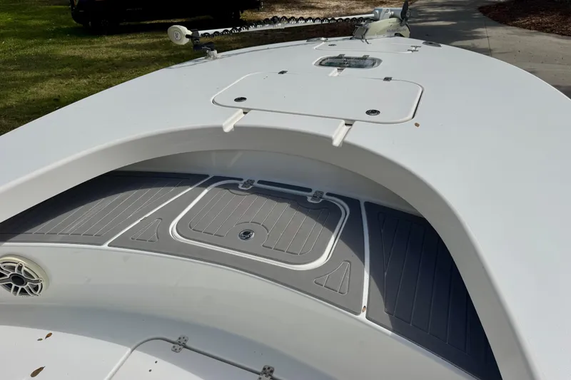 Slide: The Image of Bow of 2021 ZCB 26 Freemason boat with storage compartments and speaker. - 11