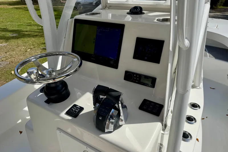 Slide: The Image of Helm of 2021 ZCB 26 Freemason boat with steering wheel and control panel. - 14