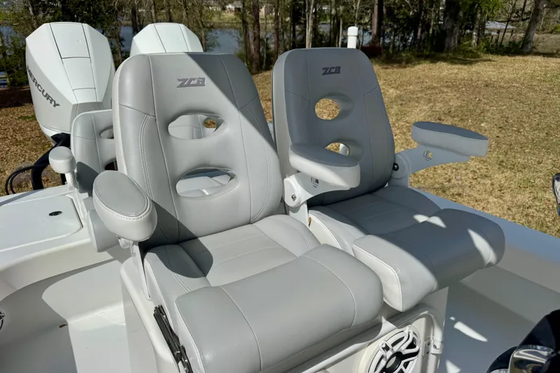 Slide: The Image of Gray leather seats on 2021 ZCB 26 Freemason boat with Mercury engines. - 16