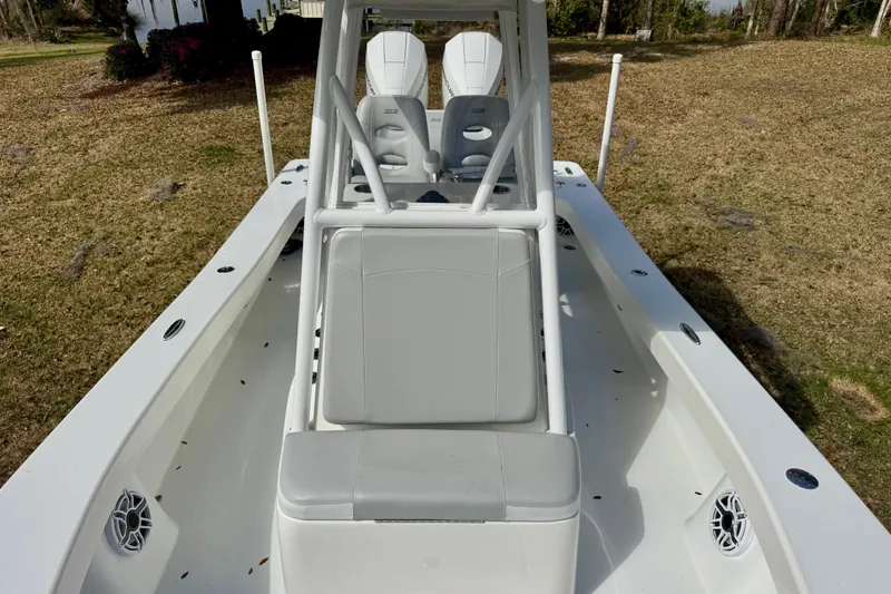 Slide: The Image of 2021 ZCB 26 Freemason boat with sleek white seating and modern design. - 9
