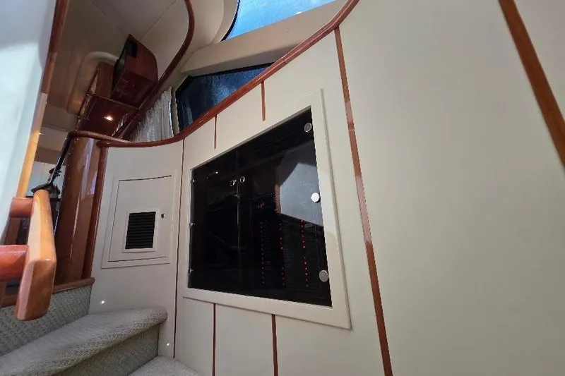 Slide: The Image of Interior view of 2008 Neptunus Flybridge MY yacht with stairs and control panel. - 100