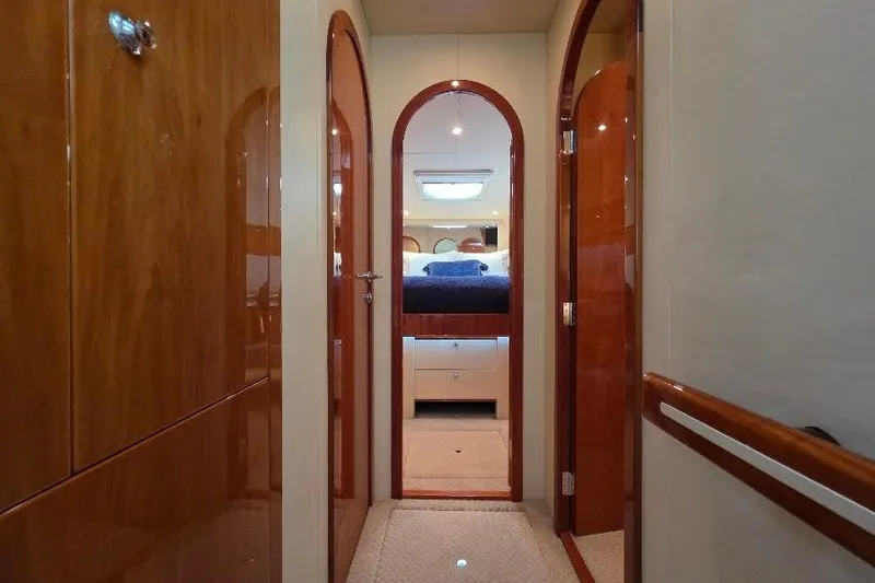 Slide: The Image of Interior hallway of 2008 Neptunus Flybridge MY yacht, featuring polished wood finishes. - 109