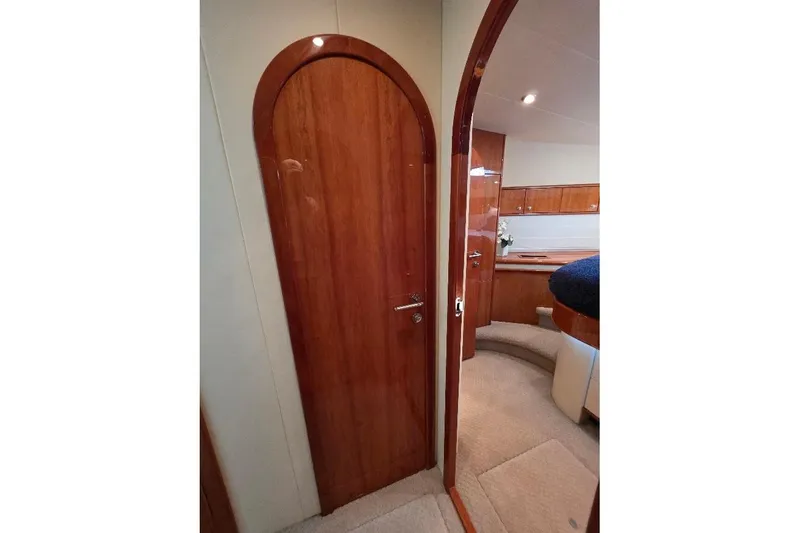 Slide: The Image of Interior of 2008 Neptunus Flybridge MY yacht with wooden doors and elegant design. - 110