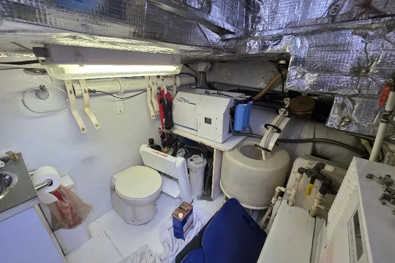 Slide: The Image of Engine room of 2008 Neptunus Flybridge MY yacht with equipment and toilet. - 161