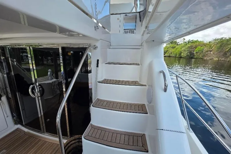 Slide: The Image of Staircase on 2008 Neptunus Flybridge MY yacht, leading to upper deck with water view. - 18