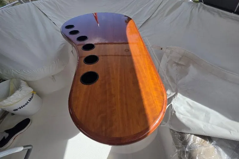 Slide: The Image of Polished wooden table with cup holders on 2008 Neptunus Flybridge MY yacht. - 31