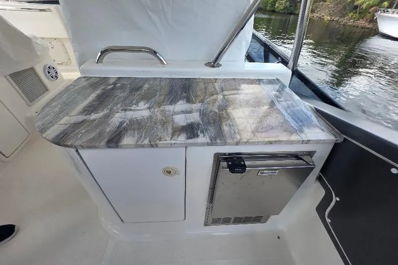 Slide: The Image of Luxury Neptunus Flybridge MY 2008 yacht interior with sleek countertop and mini fridge. - 36