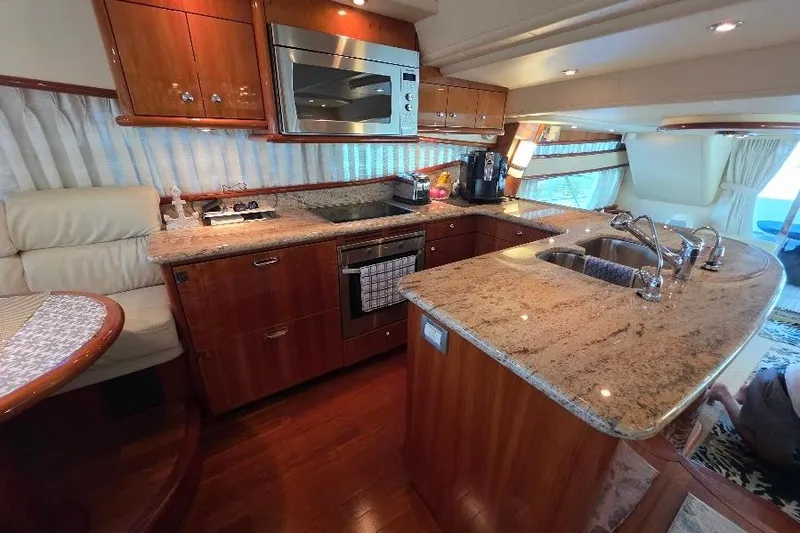 Slide: The Image of Luxurious kitchen interior of 2008 Neptunus Flybridge MY yacht with granite countertops. - 52