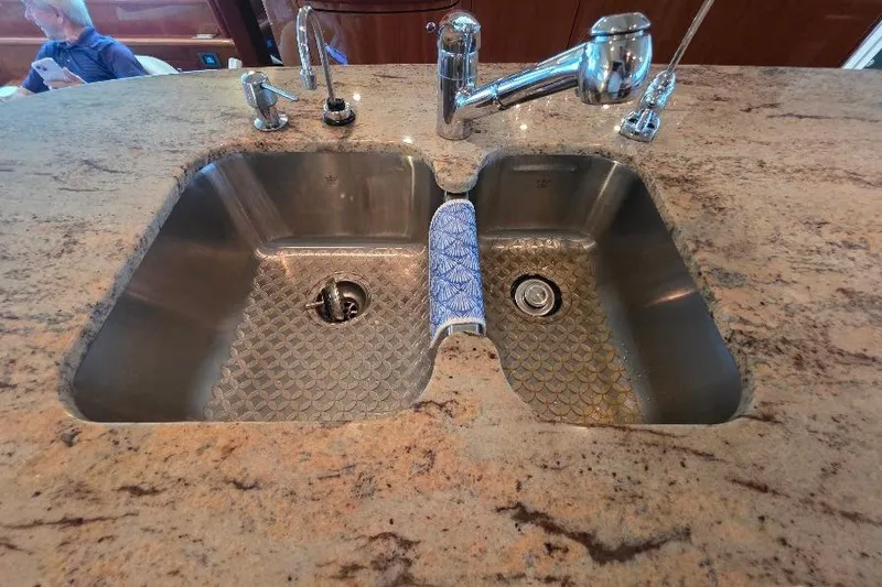 Slide: The Image of Stainless steel double sink on Neptunus Flybridge MY 2008 yacht with granite countertop. - 59