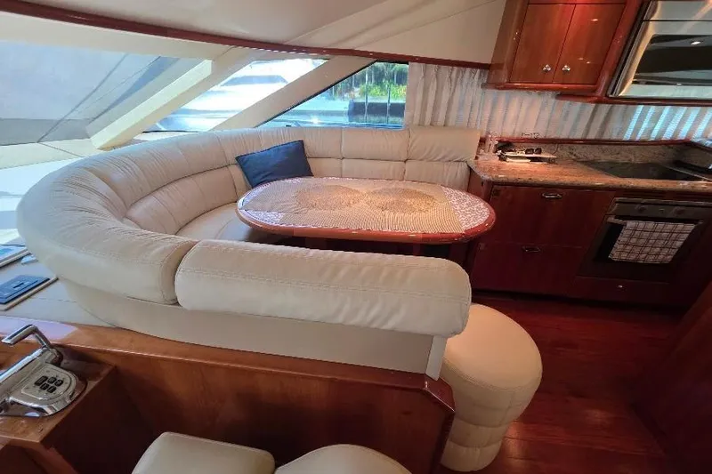 Slide: The Image of Luxurious 2008 Neptunus Flybridge MY yacht interior with plush seating and modern kitchen. - 63