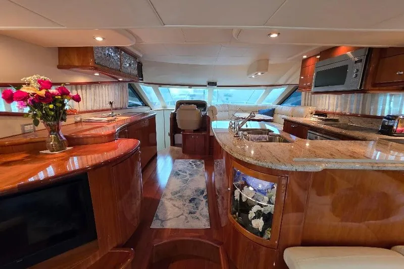 Slide: The Image of Luxurious interior of 2008 Neptunus Flybridge MY yacht with elegant wood finishes and modern amenities. - 82