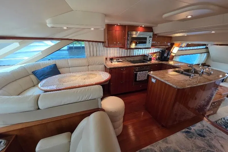 Slide: The Image of Luxurious interior of 2008 Neptunus Flybridge MY yacht with elegant kitchen and seating area. - 89