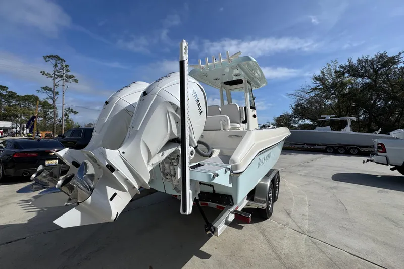 Slide: The Image of 2026 Blackwood 270 LXF boat with dual Yamaha engines on a trailer. - 12