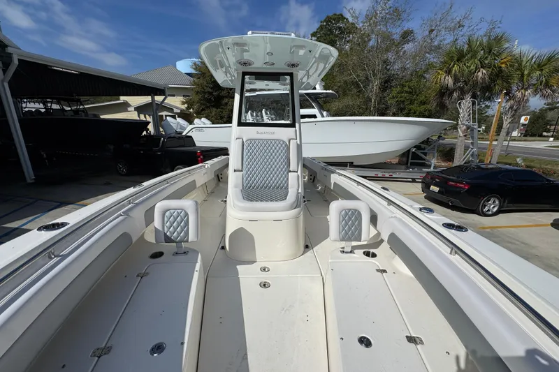 Slide: The Image of 2026 Blackwood 270 LXF boat interior with sleek seating and modern design. - 23