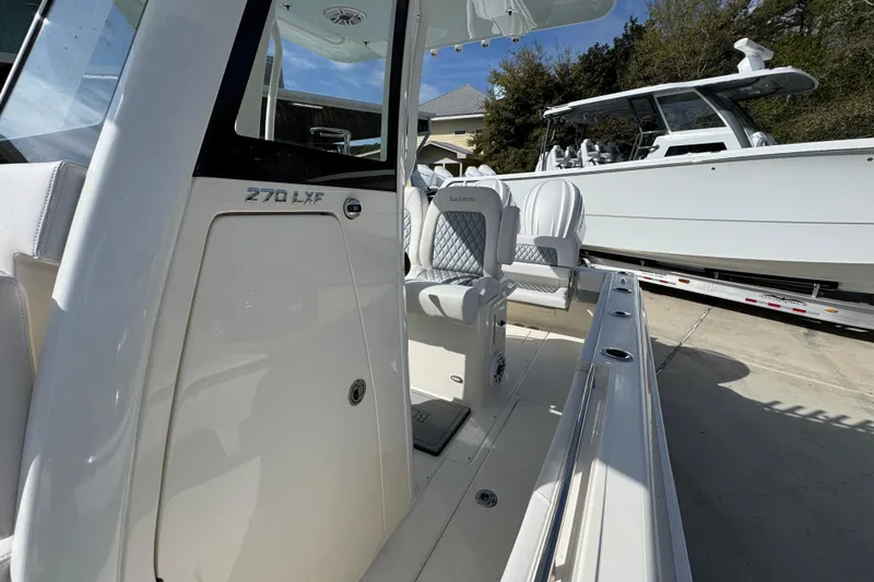 Slide: The Image of 2026 Blackwood 270 LXF boat interior with luxurious seating and sleek design. - 24