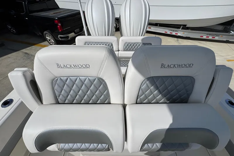 Slide: The Image of Luxurious seating on 2026 Blackwood 270 LXF boat, featuring elegant diamond stitching. - 27