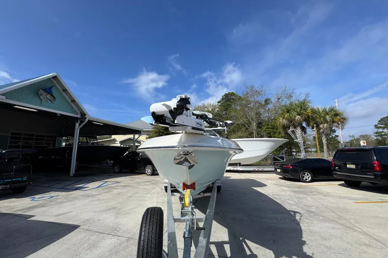 Slide: The Image of 2026 Blackwood 270 LXF boat on trailer under clear blue sky. - 6