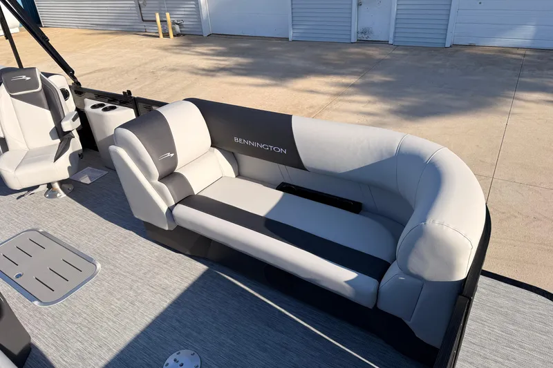 Slide: The Image of 2026 Bennington 22 S-One Quad Bench with sleek gray seating and modern design. - 12