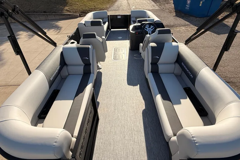 Slide: The Image of 2026 Bennington 22 S-One Quad Bench pontoon boat interior with plush seating and modern design. - 29