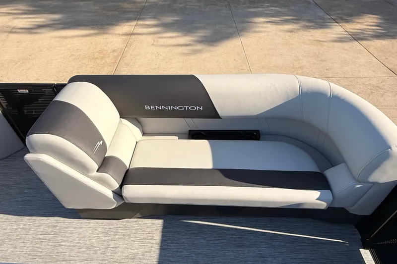Slide: The Image of 2026 Bennington 22 S-One Quad Bench with sleek gray and black upholstery. - 36