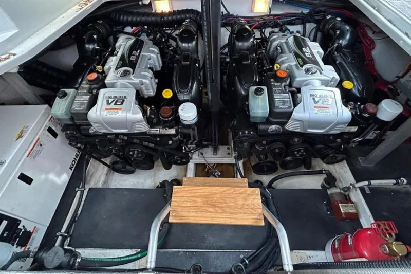 Slide: The Image of Engine room of 2015 Crownline 350 SY with dual V8 engines and Kohler generator. - 12