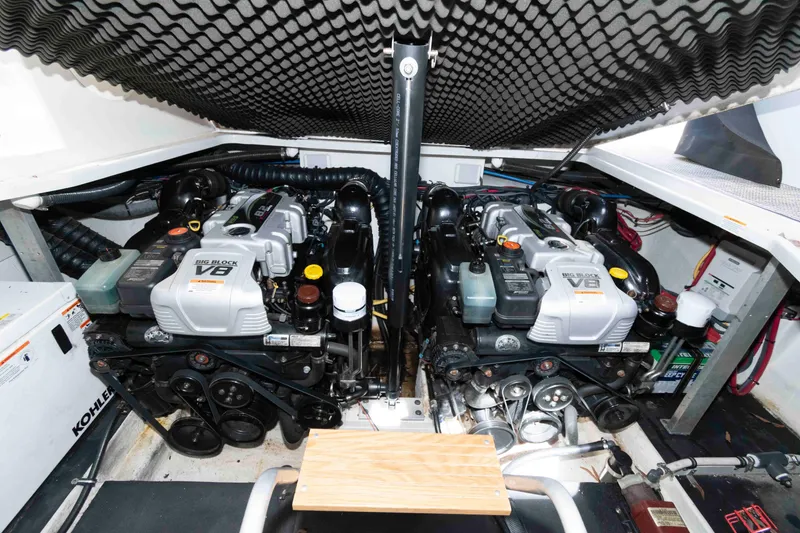 Slide: The Image of Engine room of a 2015 Crownline 350 SY with dual V8 engines. - 17