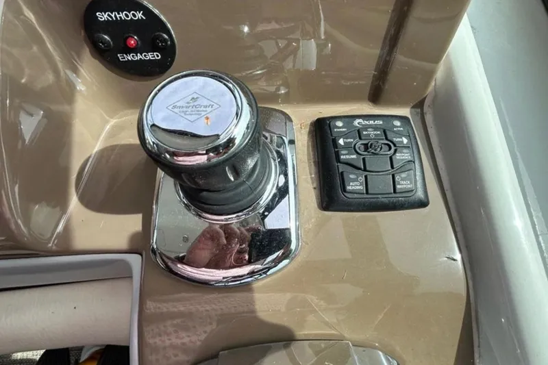 Slide: The Image of Control panel of 2015 Crownline 350 SY boat with SmartCraft joystick and Skyhook system. - 3