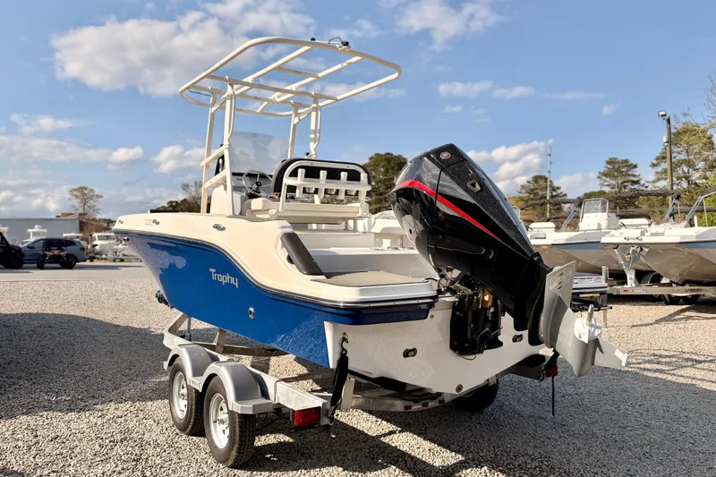 Slide: The Image of 2026 Bayliner Trophy T20CC boat on trailer, featuring sleek design and powerful outboard motor. - 5