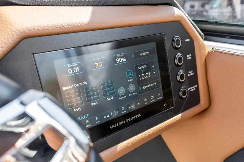 Slide: The Image of 2024 Cobalt CS23 Surf dashboard with touchscreen controls and Volvo Penta interface. - 10