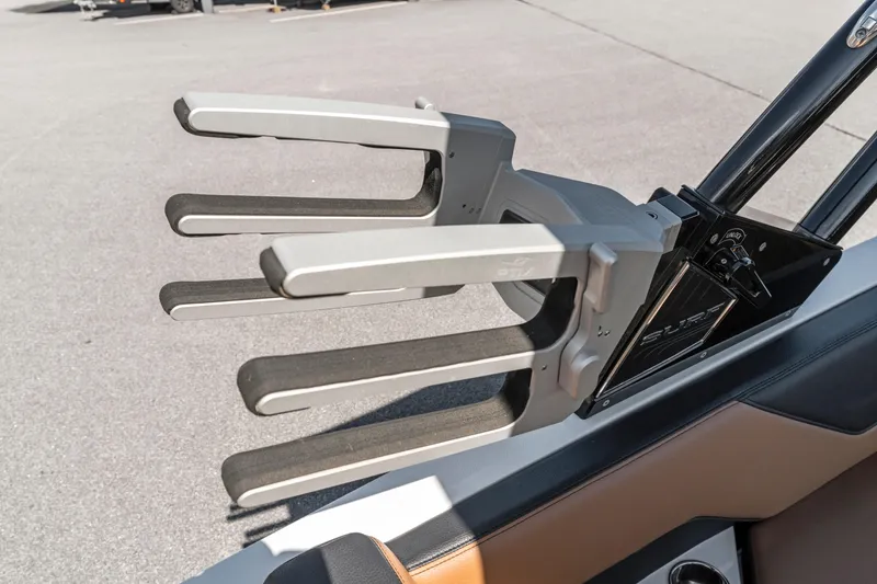 Slide: The Image of 2024 Cobalt CS23 Surf boat wakeboard rack, featuring sleek design and durable construction. - 14