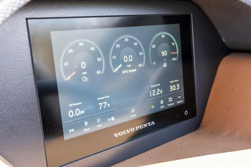Slide: The Image of 2024 Cobalt CS23 Surf dashboard display showing engine metrics and GPS speed. - 16