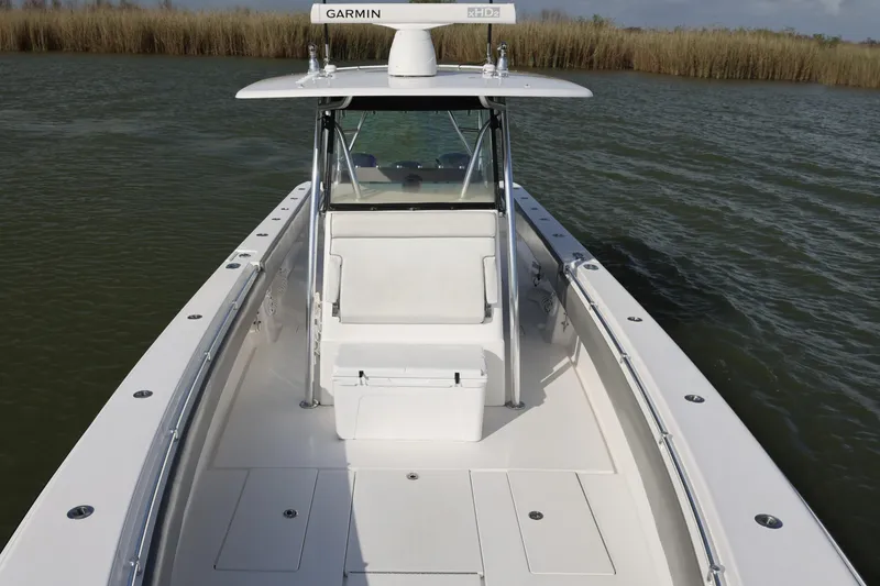 Slide: The Image of 2017 Contender 39 ST boat with Garmin radar on calm water. - 10