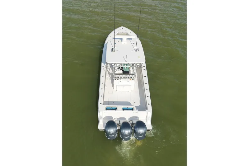 Slide: The Image of Aerial view of 2017 Contender 39 ST boat with triple outboard engines. - 7