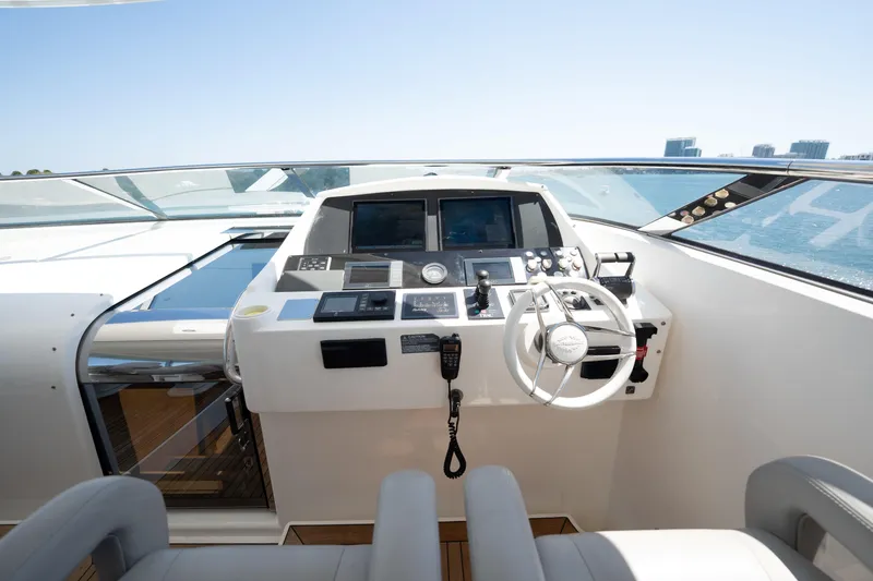 Slide: The Image of Helm of 2010 Sunseeker 34 Metre Yacht with modern navigation controls. - 14