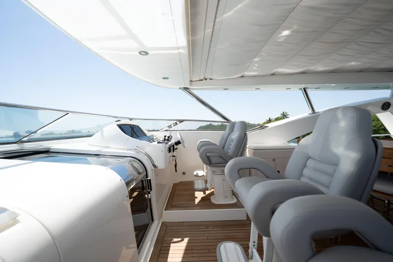 Slide: The Image of Luxurious Sunseeker 34 Metre Yacht 2010 helm with plush seating and modern controls. - 16