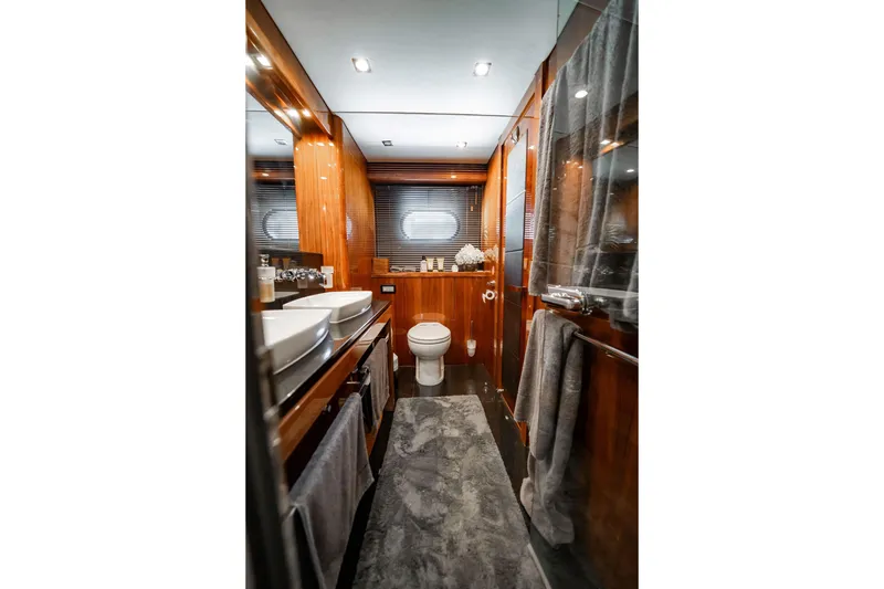 Slide: The Image of Luxurious bathroom interior of 2010 Sunseeker 34 Metre Yacht with elegant wood finishes. - 30