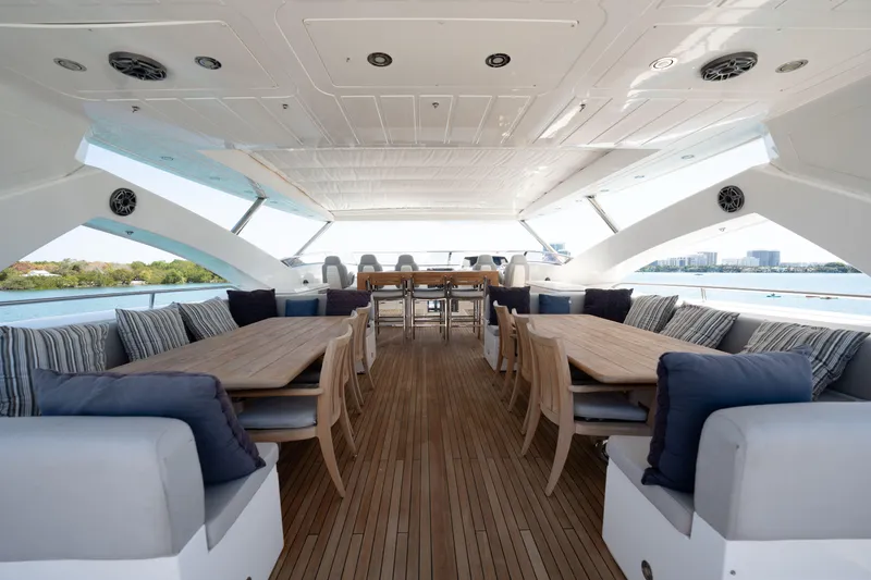 Slide: The Image of Luxurious Sunseeker 34 Metre Yacht 2010 with spacious outdoor seating and elegant wooden deck. - 31