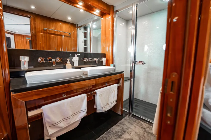 Slide: The Image of Luxurious bathroom on 2010 Sunseeker 34 Metre Yacht with dual sinks and glass shower. - 38