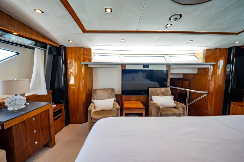Slide: The Image of Luxurious interior of 2010 Sunseeker 34 Metre Yacht with elegant wood finishes and plush seating. - 48