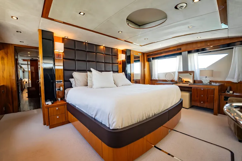 Slide: The Image of Luxurious bedroom interior of 2010 Sunseeker 34 Metre Yacht with elegant wood finishes. - 53