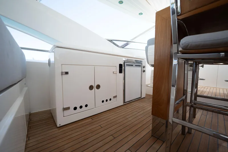 Slide: The Image of Luxurious interior of 2010 Sunseeker 34 Metre Yacht with sleek cabinetry and seating. - 68