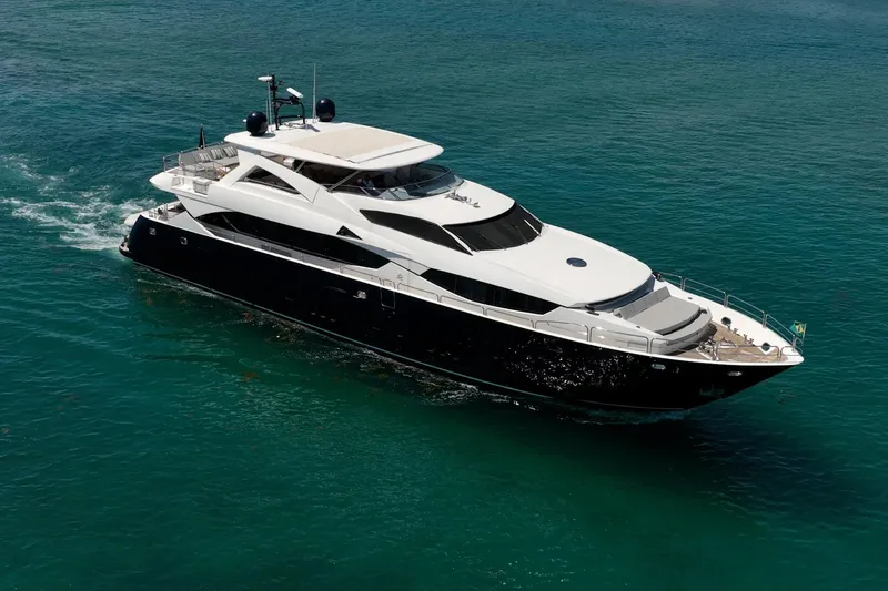 Slide: The Image of Luxurious 2010 Sunseeker 34 Metre Yacht cruising on clear blue waters. - 7