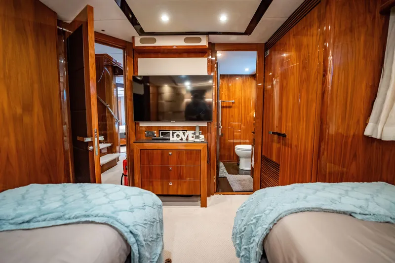 Slide: The Image of Luxurious Sunseeker 34 Metre Yacht 2010 interior with twin beds and elegant wood finish. - 71