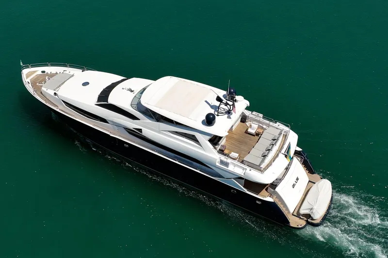 Slide: The Image of Sunseeker 34 Metre Yacht 2010 cruising on clear blue water, aerial view. - 8