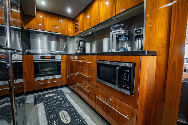 Slide: The Image of Luxurious kitchen interior on a 2010 Sunseeker 34 Metre Yacht with modern appliances. - 81