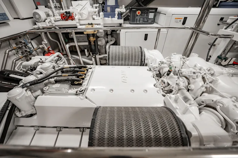 Slide: The Image of Engine room of a 2010 Sunseeker 34 Metre Yacht, showcasing mechanical components and systems. - 86