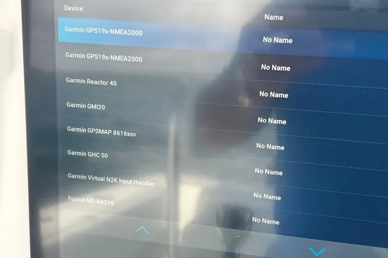 Slide: The Image of Display screen showing connected Garmin devices on a 2013 Contender 32 ST boat. - 55