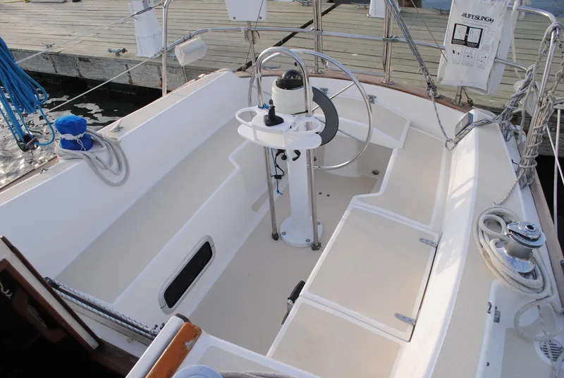 Slide: The Image of Interior view of a 1988 Tartan 28 sailboat cockpit. - 11