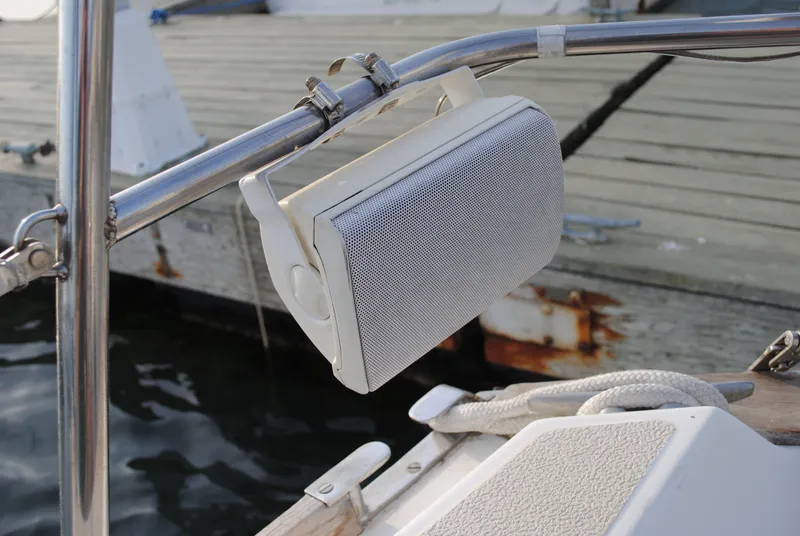 Slide: The Image of Interior of a 1988 Tartan 28 sailboat with blue cushions. - 21